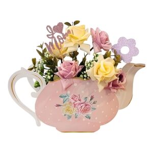 Artificial flowers + decorative box +  "I Love Mom" sign.